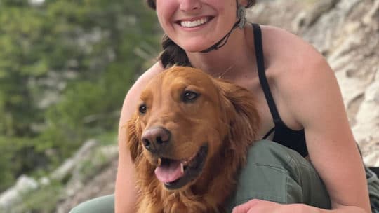 Gabrielle Murray Poses With Her Golden Retriever
